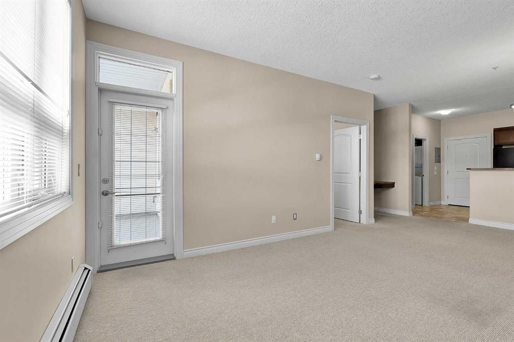 318-26 Val Gardena View Sw, Calgary, AB - Indoor Photo Showing Other Room
