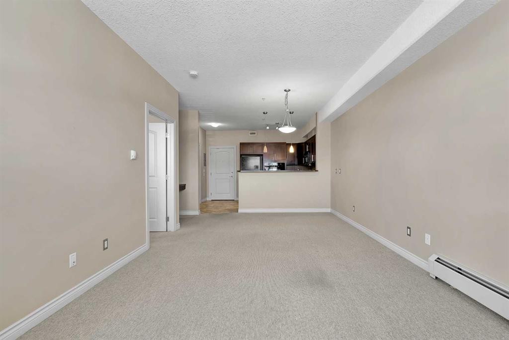 318-26 Val Gardena View Sw, Calgary, AB - Indoor Photo Showing Other Room