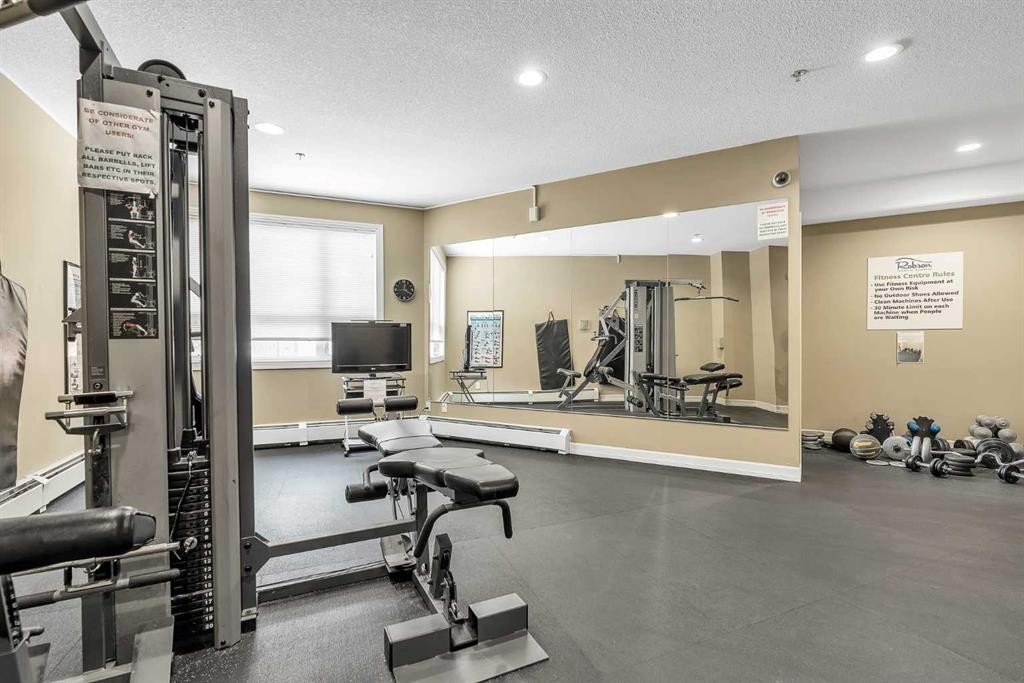318-26 Val Gardena View Sw, Calgary, AB - Indoor Photo Showing Gym Room
