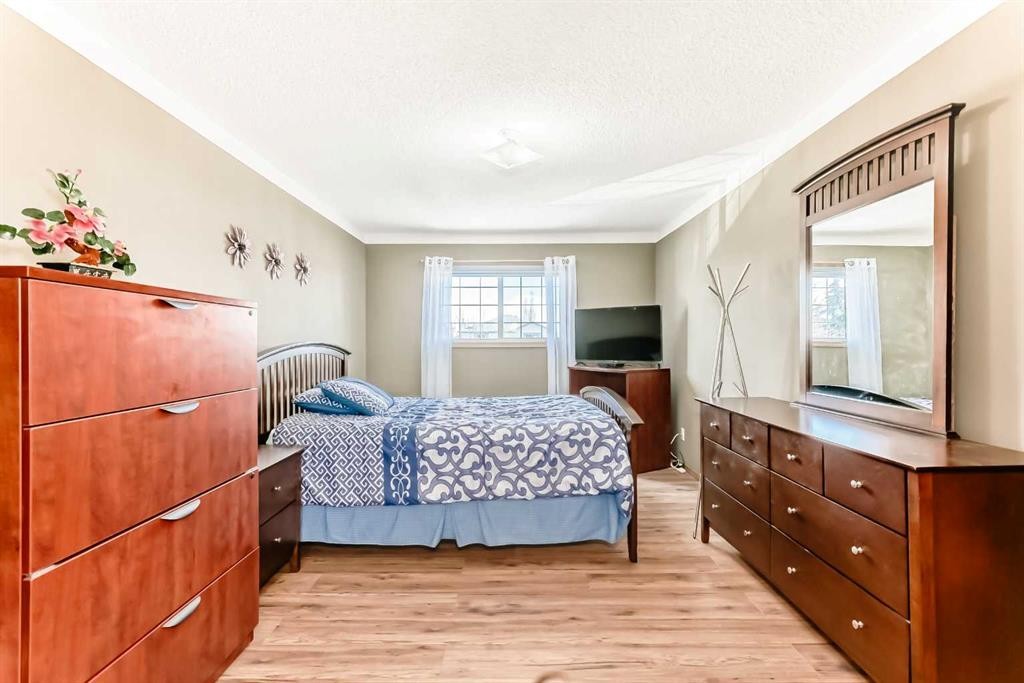 69 Applemont Place Se, Calgary, AB - Indoor Photo Showing Bedroom