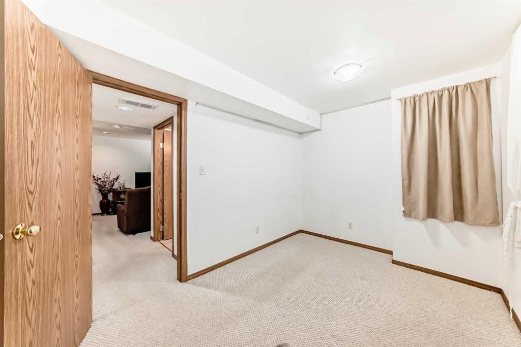 69 Applemont Place Se, Calgary, AB - Indoor Photo Showing Other Room
