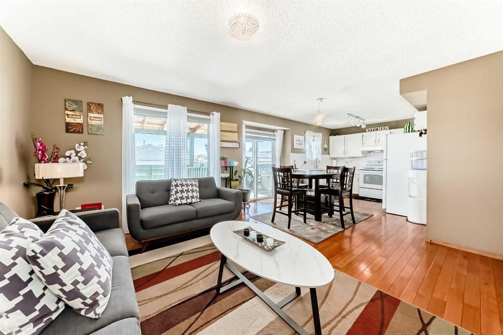 69 Applemont Place Se, Calgary, AB - Indoor Photo Showing Living Room