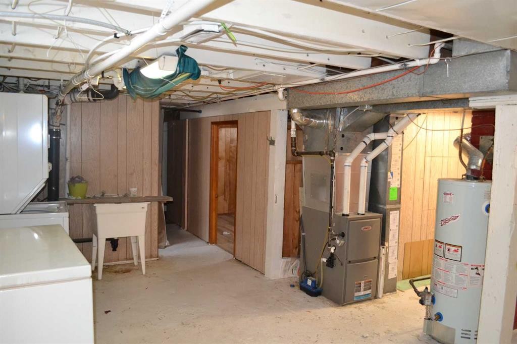 915 1 Street Nw, Calgary, AB - Indoor Photo Showing Basement
