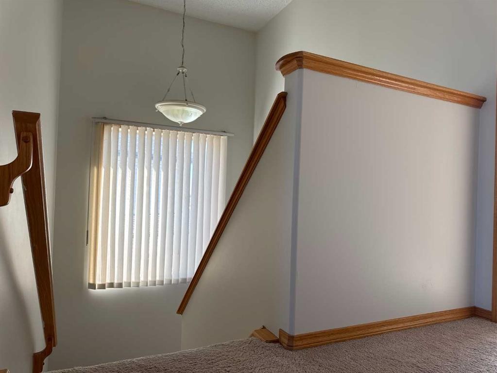244 Los Alamos Place Ne, Calgary, AB - Indoor Photo Showing Other Room