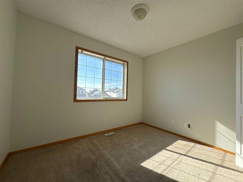 244 Los Alamos Place Ne, Calgary, AB - Indoor Photo Showing Other Room