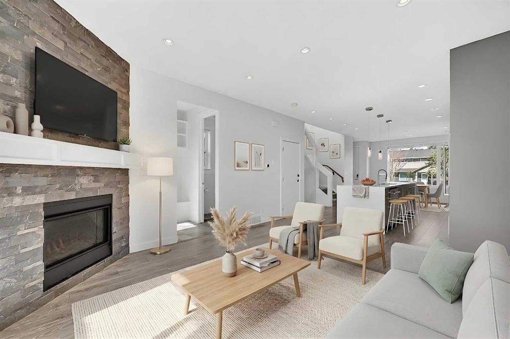 935 Regal Crescent Ne, Calgary, AB - Indoor Photo Showing Living Room With Fireplace