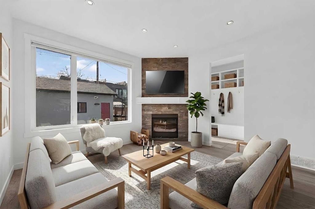 935 Regal Crescent Ne, Calgary, AB - Indoor Photo Showing Living Room With Fireplace