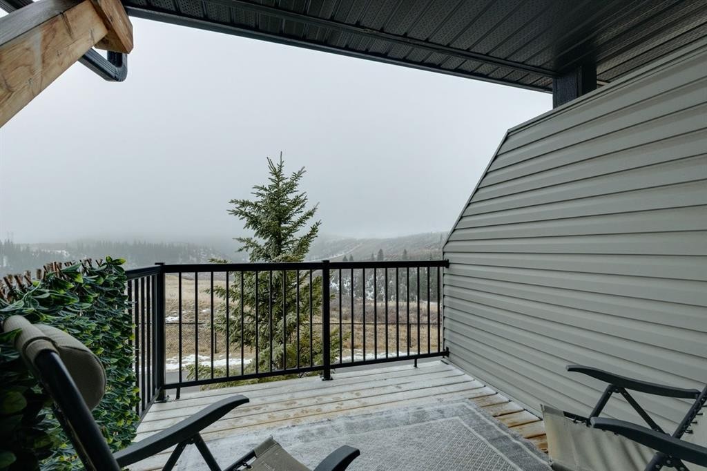 1502 Jumping Pound Common, Cochrane, AB - Outdoor With Exterior