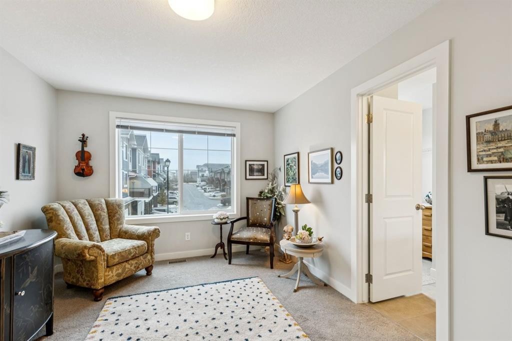 1502 Jumping Pound Common, Cochrane, AB - Indoor Photo Showing Other Room