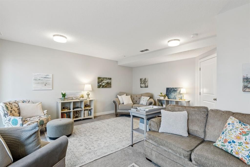 1502 Jumping Pound Common, Cochrane, AB - Indoor Photo Showing Living Room