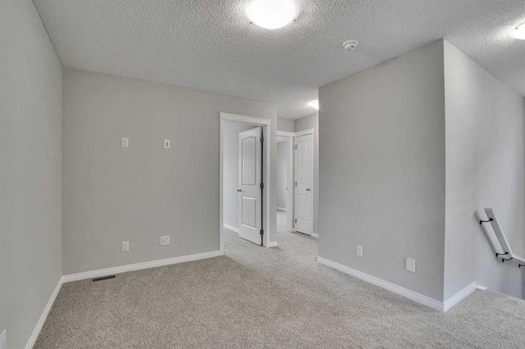 667 Wolf Willow Boulevard Se, Calgary, AB - Indoor Photo Showing Other Room