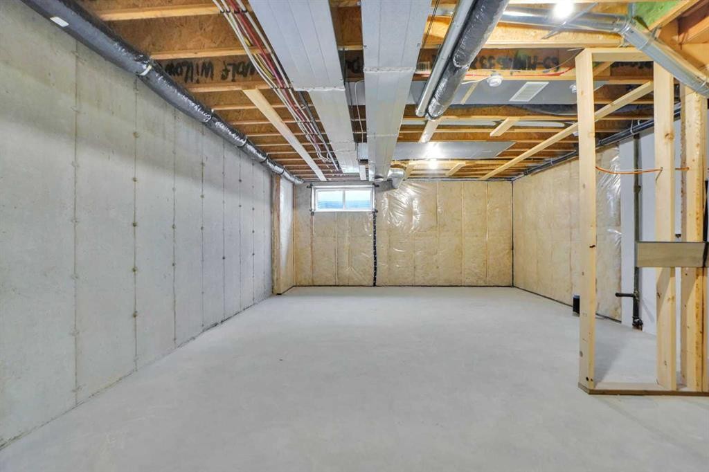 667 Wolf Willow Boulevard Se, Calgary, AB - Indoor Photo Showing Basement