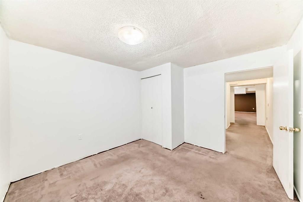 130 Pinemeadow Road Ne, Calgary, AB - Indoor Photo Showing Other Room