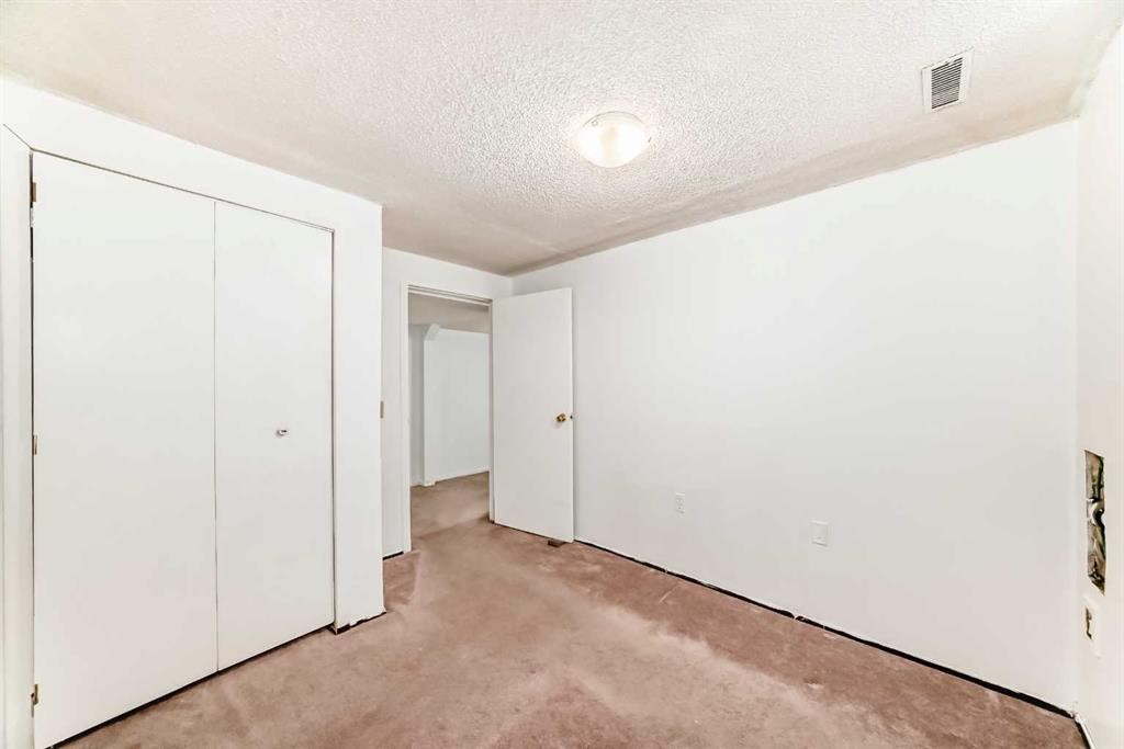 130 Pinemeadow Road Ne, Calgary, AB - Indoor Photo Showing Other Room