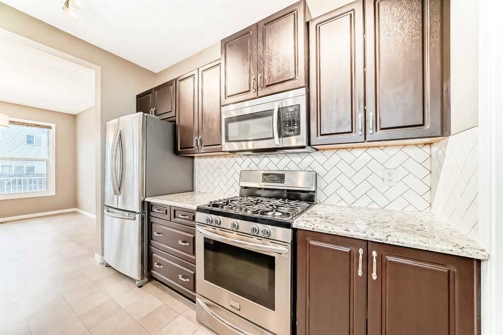 144 Auburn Glen Close Se, Calgary, AB - Indoor Photo Showing Kitchen With Upgraded Kitchen