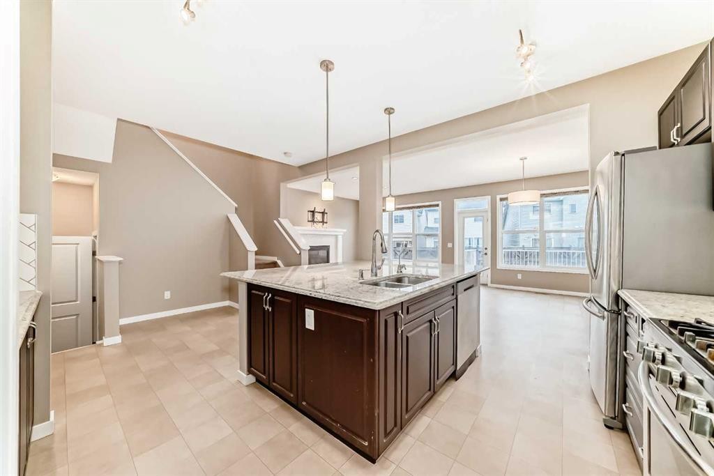 144 Auburn Glen Close Se, Calgary, AB - Indoor Photo Showing Kitchen With Double Sink With Upgraded Kitchen