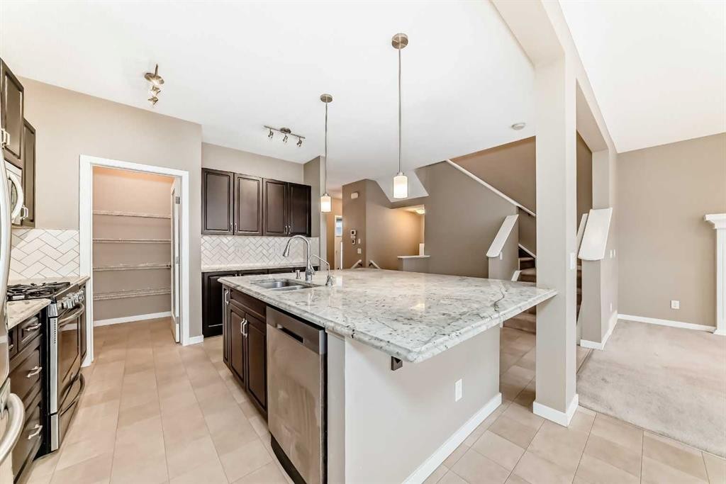 144 Auburn Glen Close Se, Calgary, AB - Indoor Photo Showing Kitchen With Upgraded Kitchen