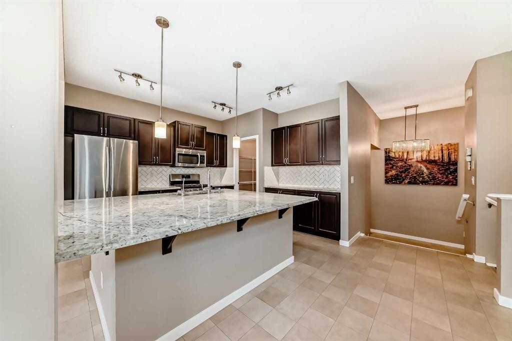 144 Auburn Glen Close Se, Calgary, AB - Indoor Photo Showing Kitchen With Upgraded Kitchen