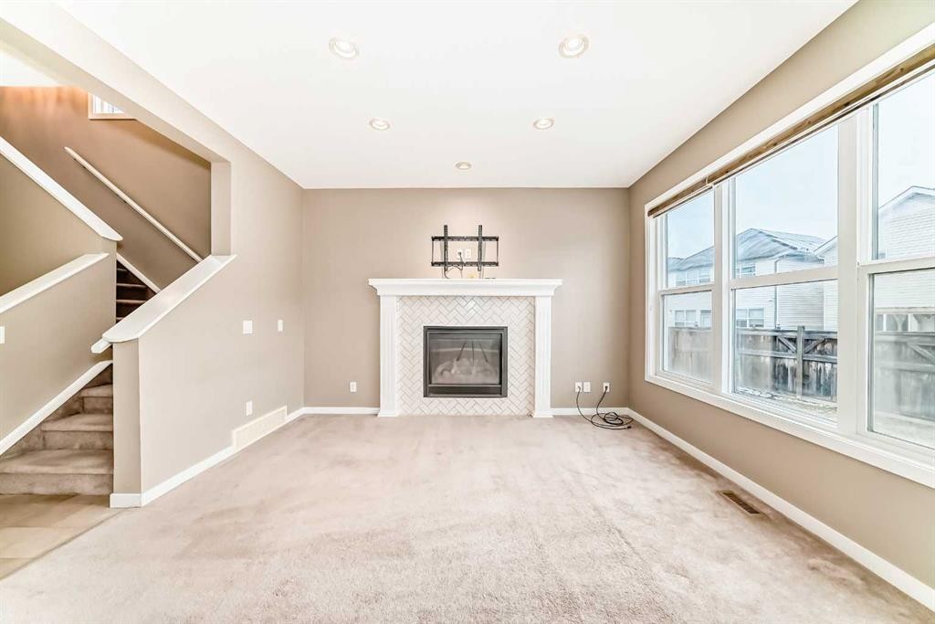 144 Auburn Glen Close Se, Calgary, AB - Indoor With Fireplace