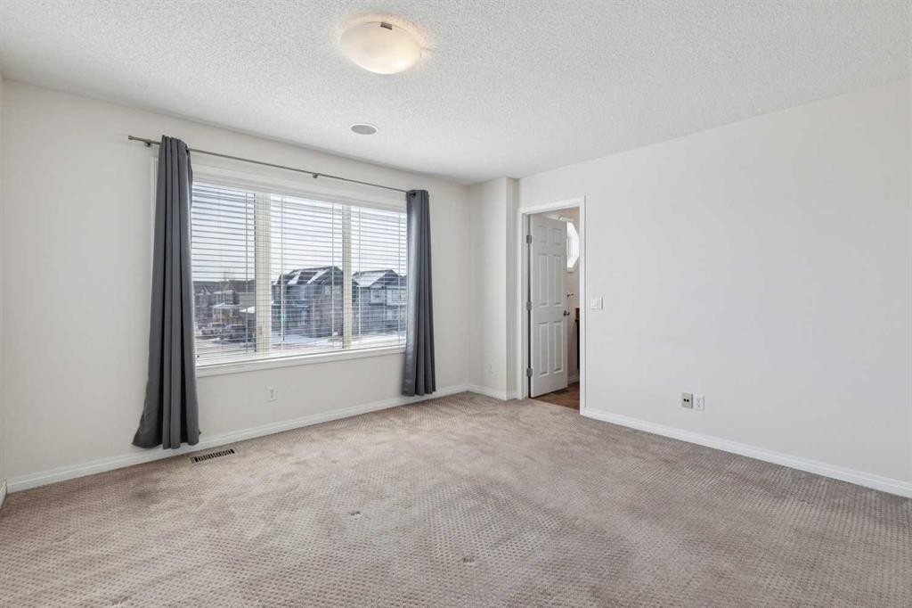 200 Silverado Drive Sw, Calgary, AB - Indoor Photo Showing Other Room