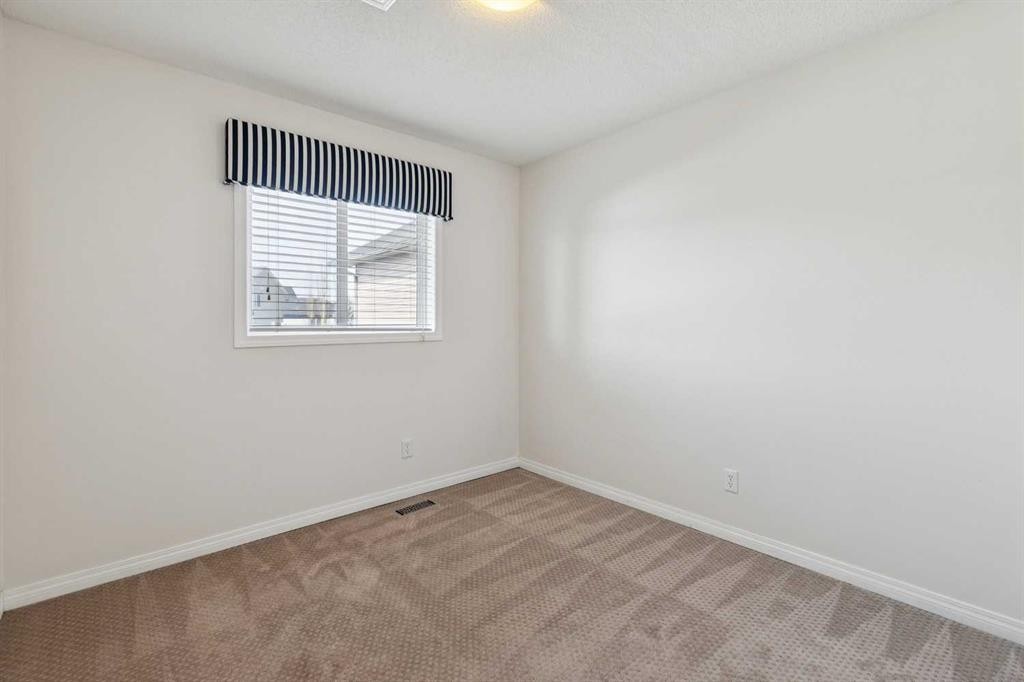 200 Silverado Drive Sw, Calgary, AB - Indoor Photo Showing Other Room