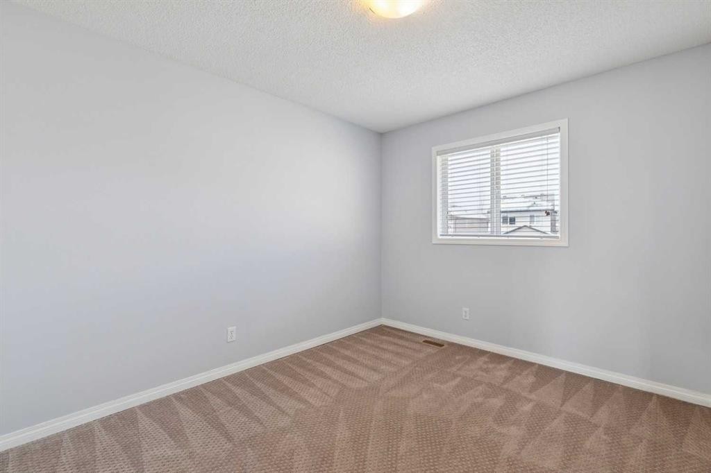 200 Silverado Drive Sw, Calgary, AB - Indoor Photo Showing Other Room