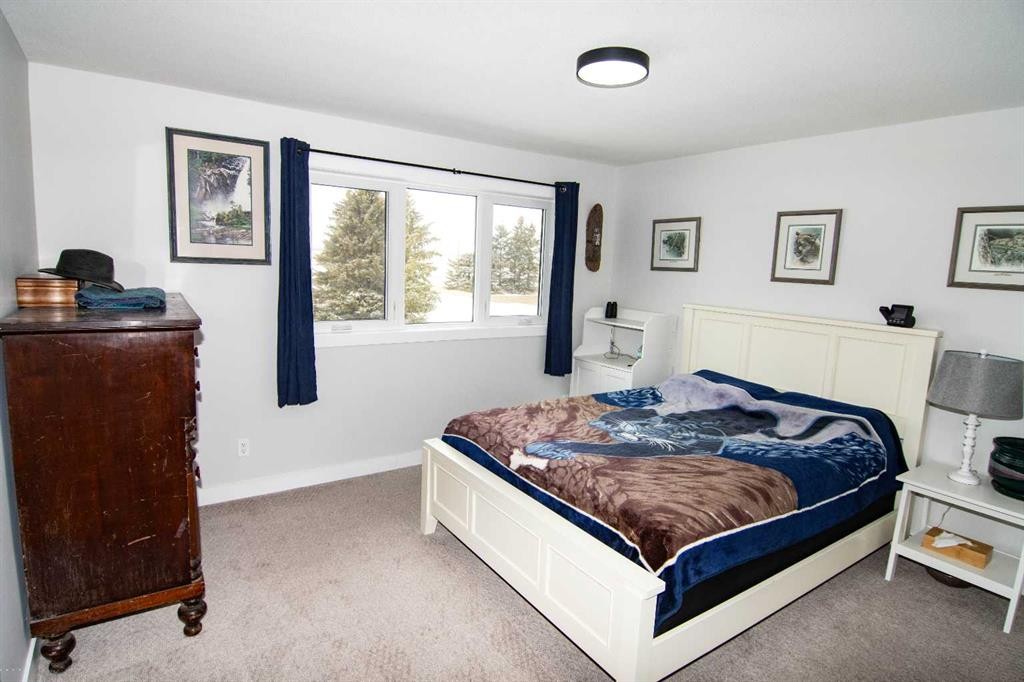 33233 Range Road 284, Rural Mountain View County, AB - Indoor Photo Showing Bedroom