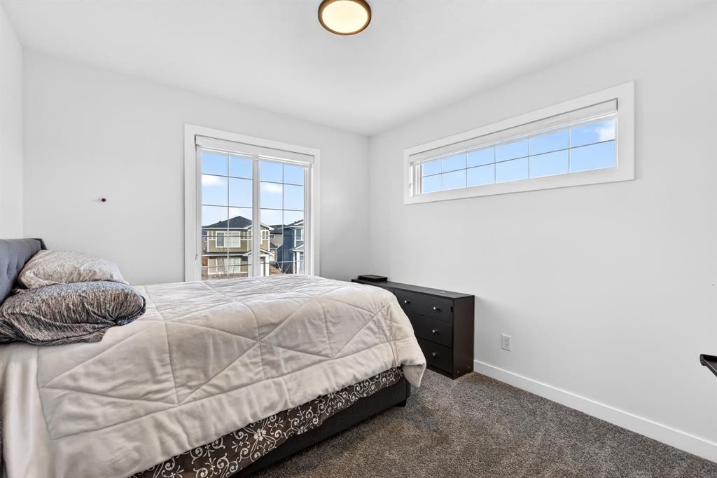 208 Dawson Circle, Chestermere, AB - Indoor Photo Showing Bedroom