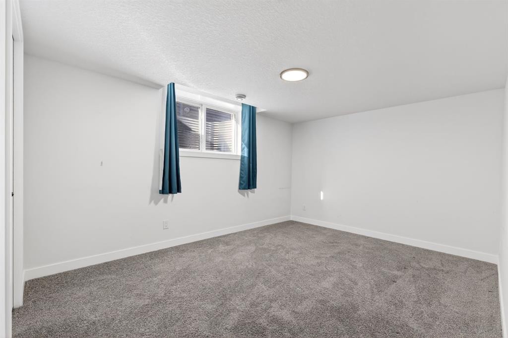 208 Dawson Circle, Chestermere, AB - Indoor Photo Showing Other Room