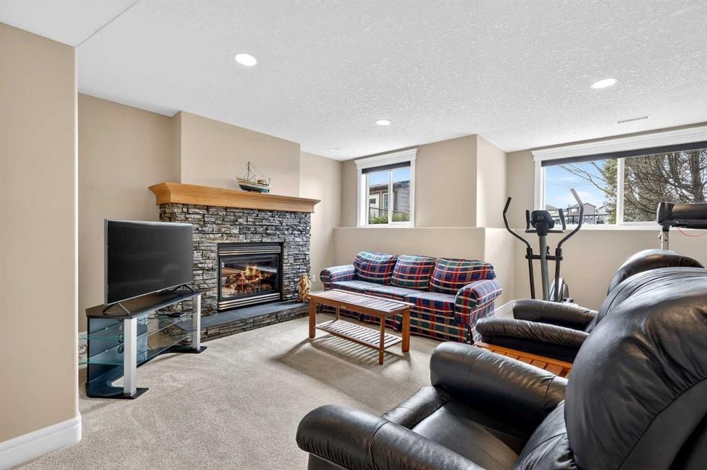 103 Kincora View Nw, Calgary, AB - Indoor Photo Showing Living Room With Fireplace