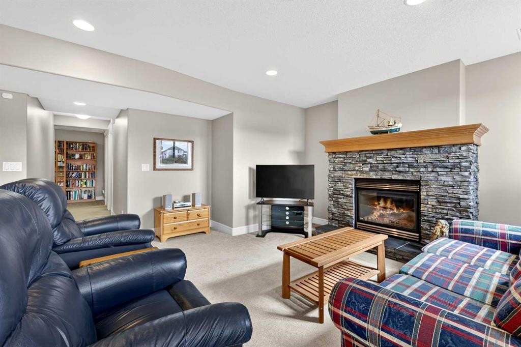 103 Kincora View Nw, Calgary, AB - Indoor Photo Showing Living Room With Fireplace
