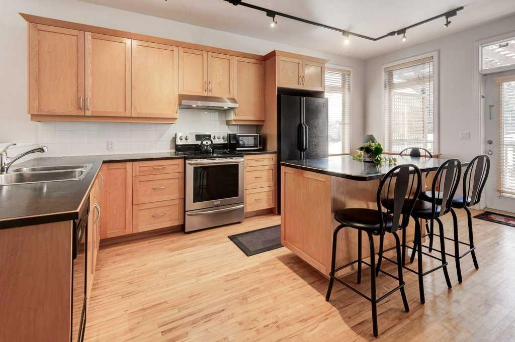 703 52 Avenue Sw, Calgary, AB - Indoor Photo Showing Kitchen With Double Sink