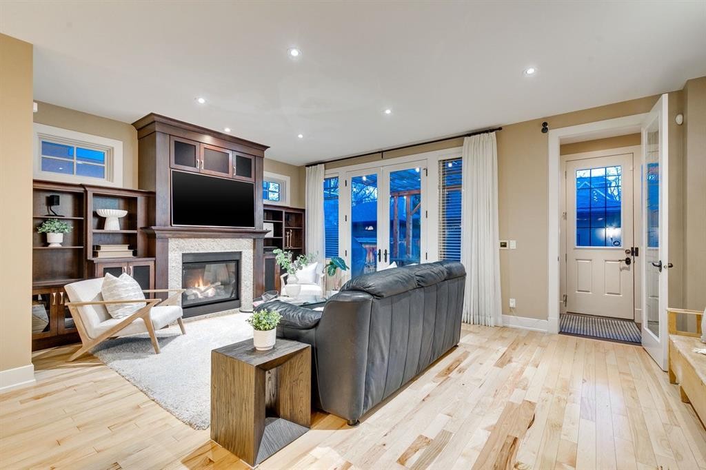 1727 Bowness Road Nw, Calgary, AB - Indoor Photo Showing Living Room With Fireplace