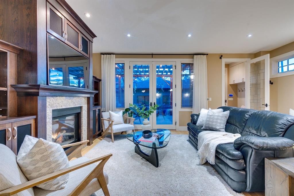 1727 Bowness Road Nw, Calgary, AB - Indoor Photo Showing Living Room With Fireplace