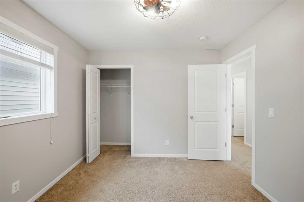 76 Nolancrest Green Nw, Calgary, AB - Indoor Photo Showing Other Room
