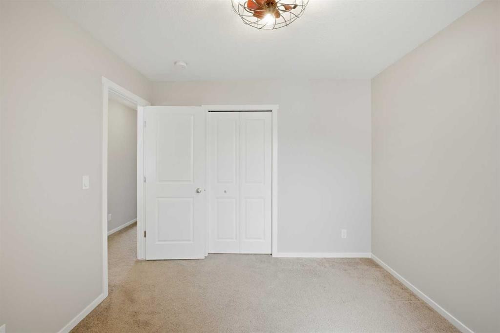 76 Nolancrest Green Nw, Calgary, AB - Indoor Photo Showing Other Room