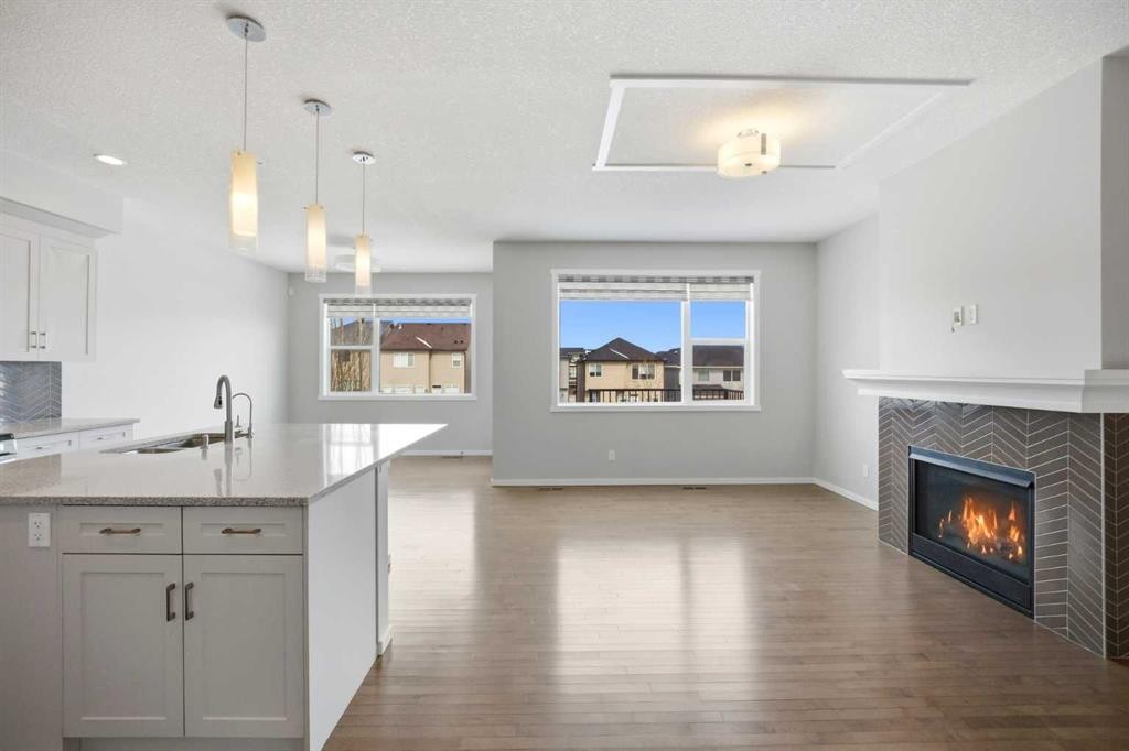 76 Nolancrest Green Nw, Calgary, AB - Indoor With Fireplace