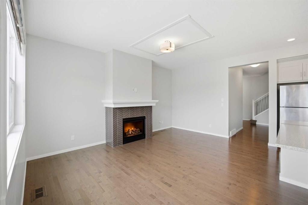 76 Nolancrest Green Nw, Calgary, AB - Indoor With Fireplace