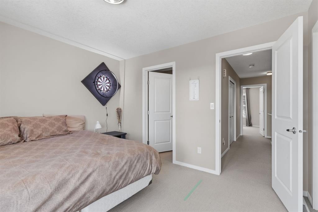 412 Ascot Circle Sw, Calgary, AB - Indoor Photo Showing Bedroom