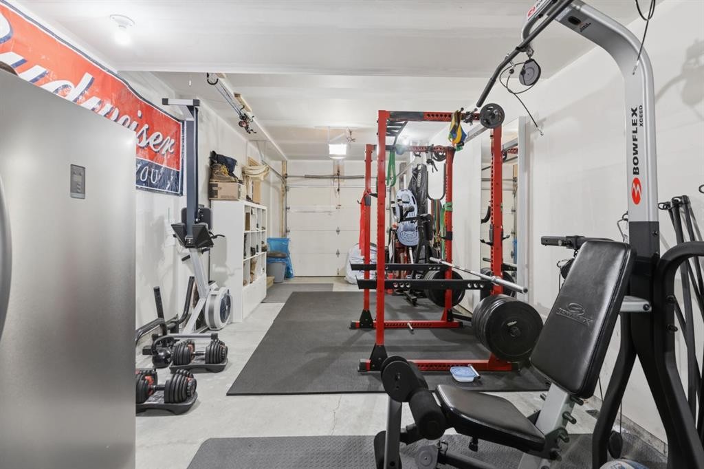412 Ascot Circle Sw, Calgary, AB - Indoor Photo Showing Gym Room