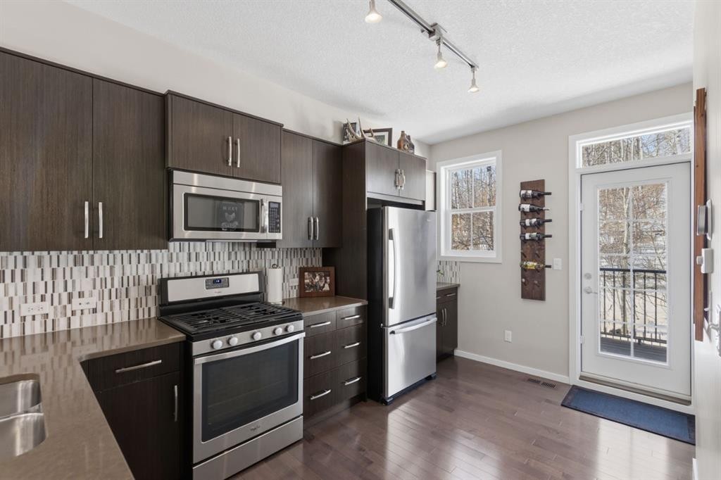 412 Ascot Circle Sw, Calgary, AB - Indoor Photo Showing Kitchen With Stainless Steel Kitchen With Double Sink