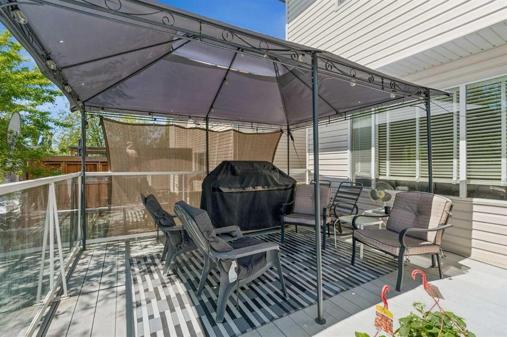 115 Cove Crescent, Chestermere, AB - Outdoor With Deck Patio Veranda With Exterior
