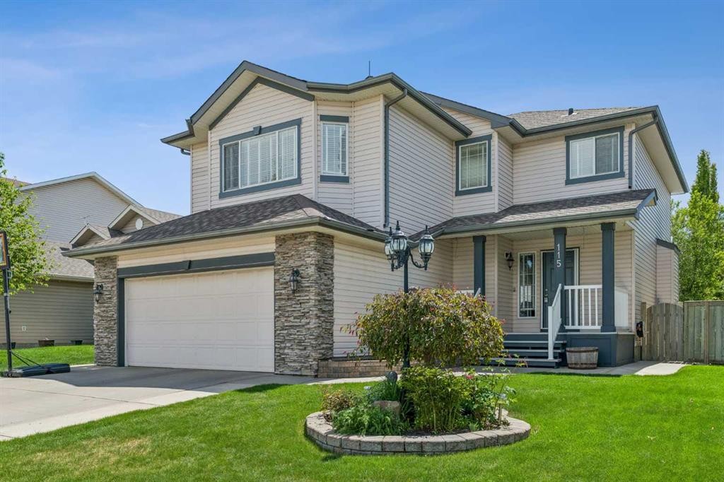 115 Cove Crescent, Chestermere, AB - Outdoor With Facade