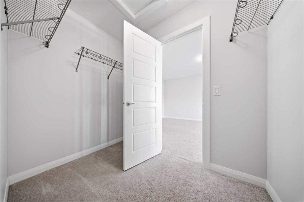 32 Red Embers Square Ne, Calgary, AB - Indoor Photo Showing Other Room