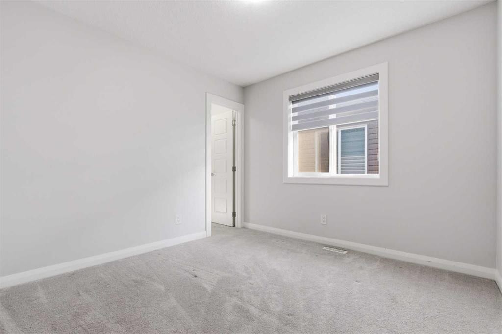 32 Red Embers Square Ne, Calgary, AB - Indoor Photo Showing Other Room