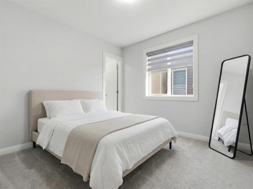 32 Red Embers Square Ne, Calgary, AB - Indoor Photo Showing Bedroom