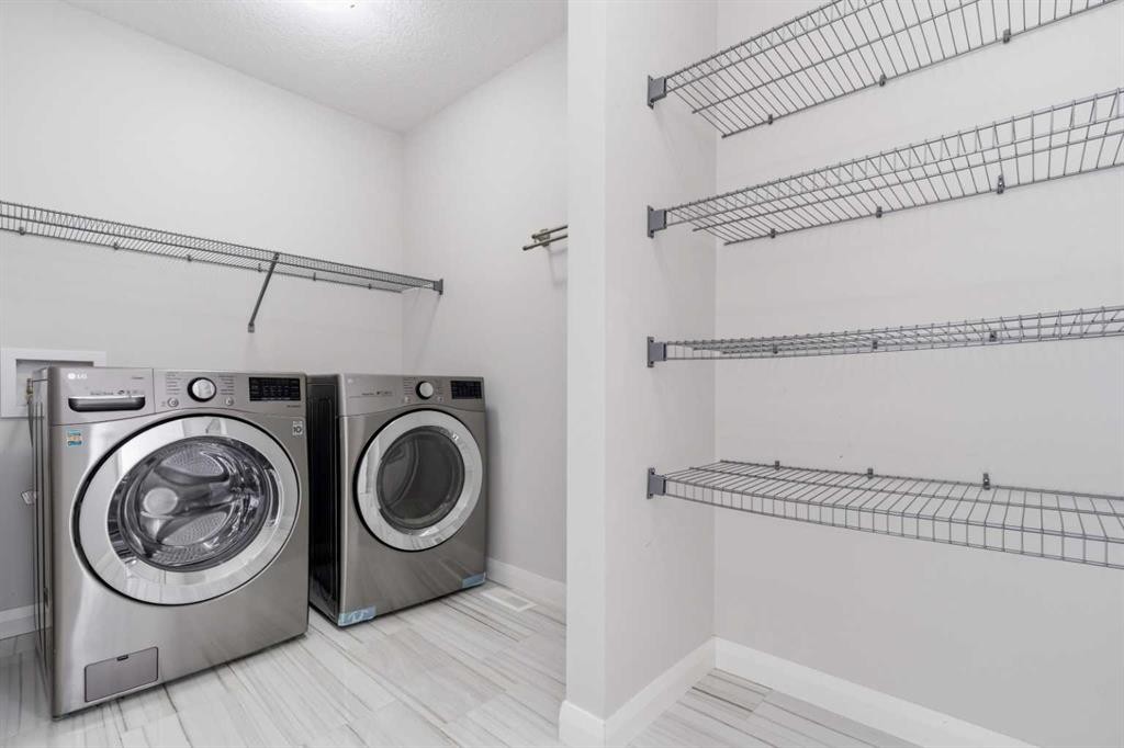 32 Red Embers Square Ne, Calgary, AB - Indoor Photo Showing Laundry Room