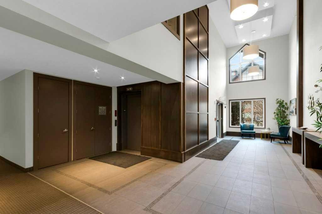 2104-15 Sunset Square, Cochrane, AB - Indoor Photo Showing Other Room