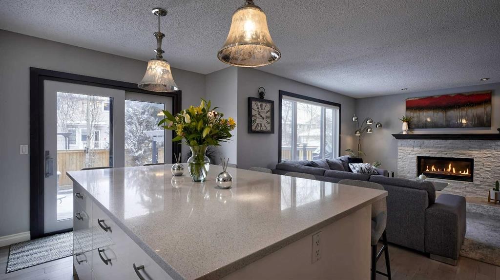 125 Riverview Place Se, Calgary, AB - Indoor Photo Showing Other Room With Fireplace