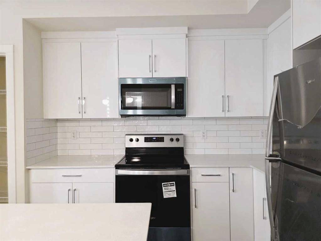 2220-15 Skyview Point Crescent, Calgary, AB - Indoor Photo Showing Kitchen With Upgraded Kitchen